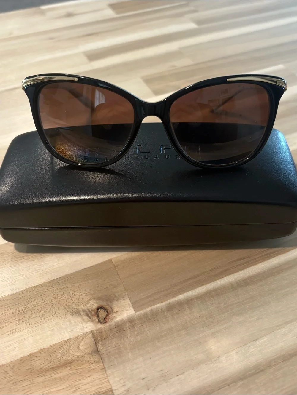 Ralph Lauren Black Sunglasses with Subtle Gold Accents